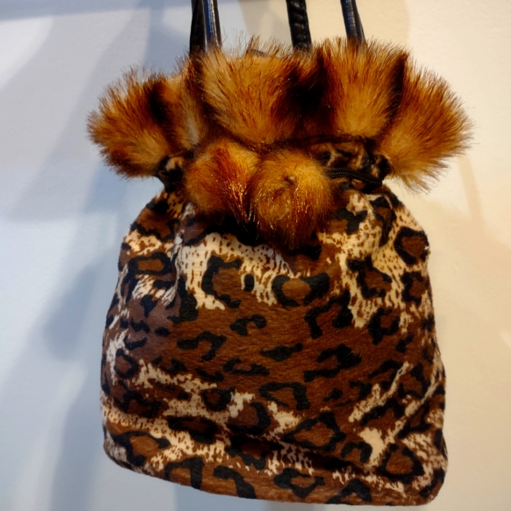 (2) Small FAU Fur Clutch Bags-no brand-hand made. Draw string closure.